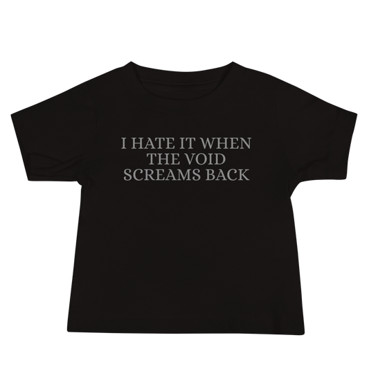 "I hate it when the void screams back" printed on a black baby jersey short sleeve tee laying on a flat surface
