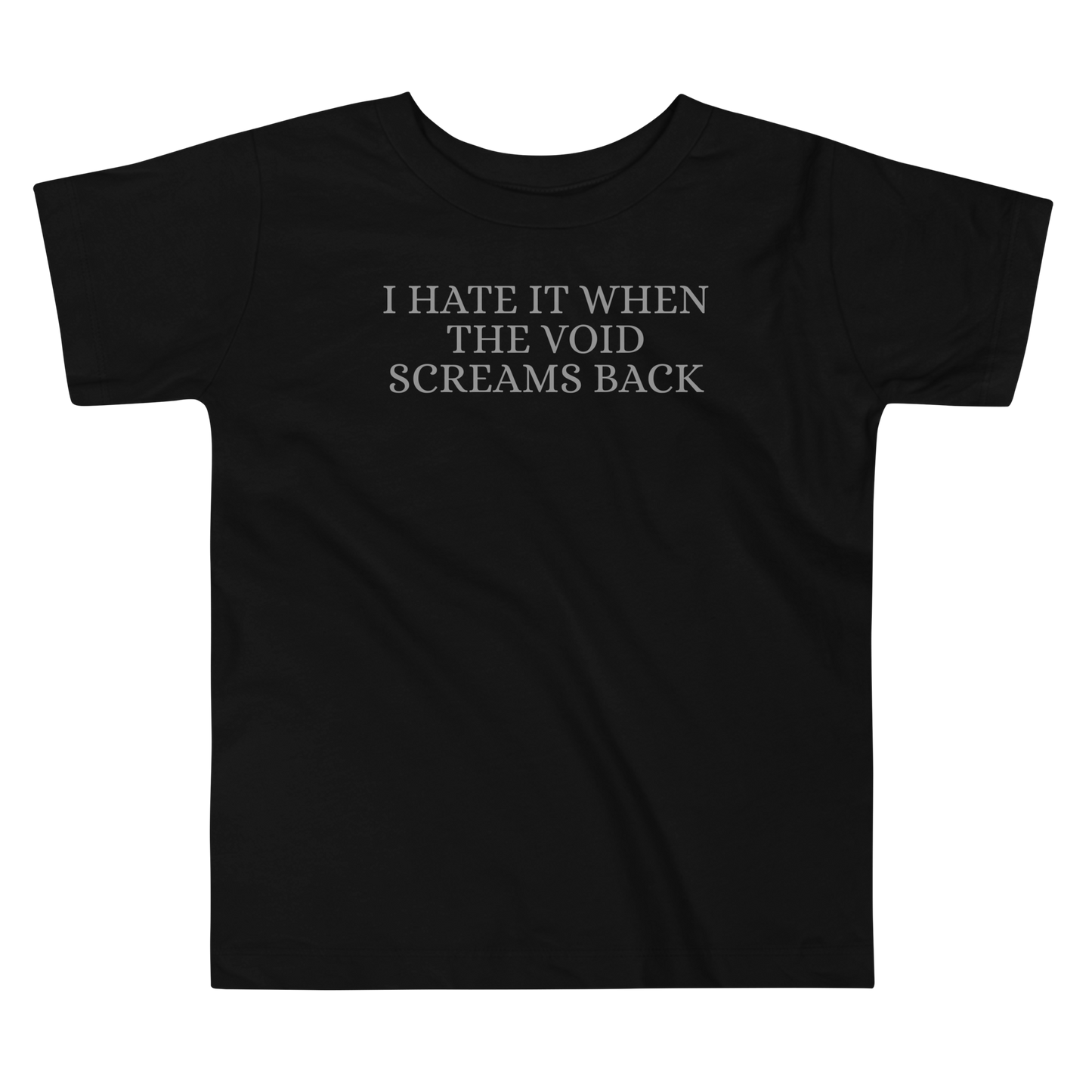 "I hate it when the void screams back" printed on a black toddler short sleeve tee laying on a flat surface