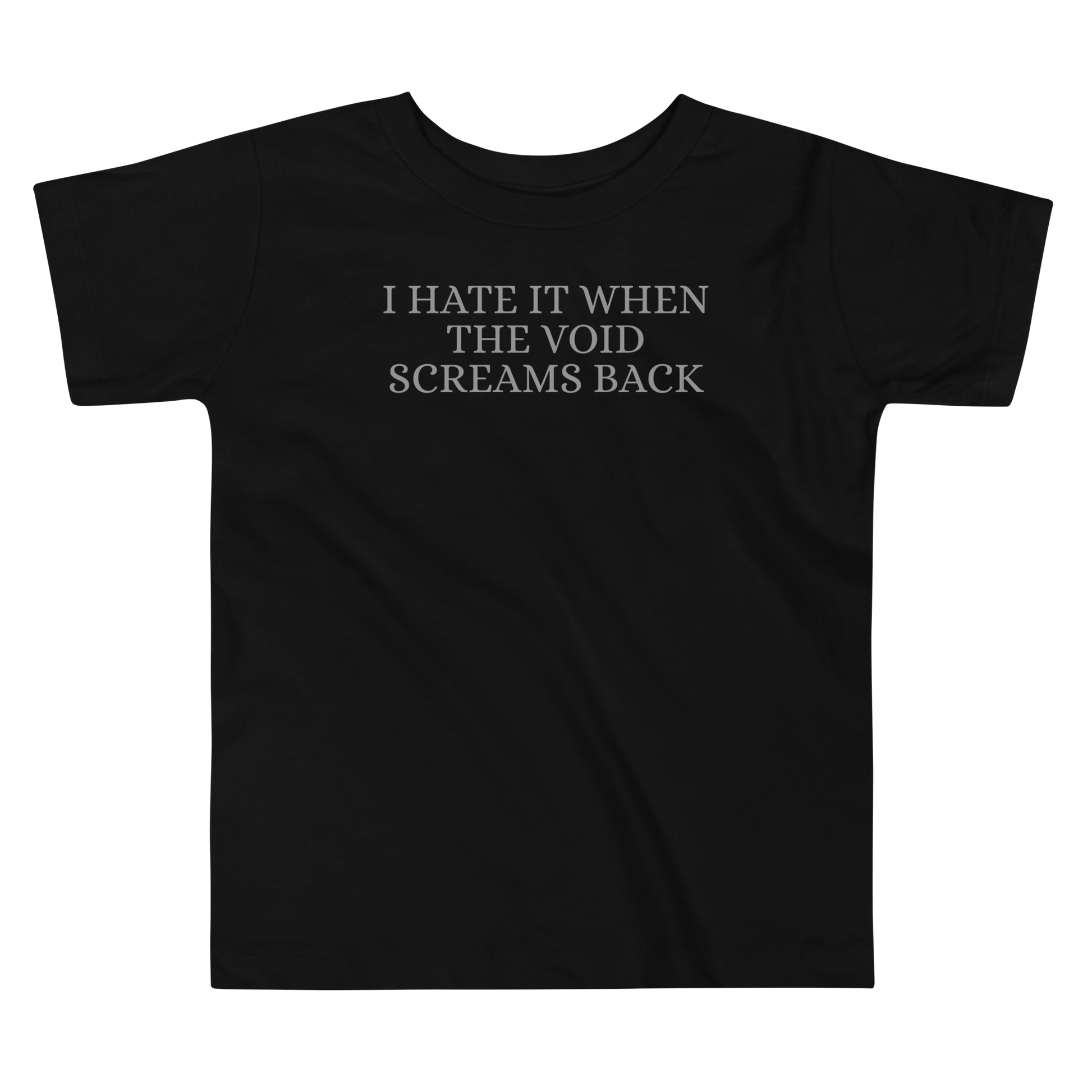 "I hate it when the void screams back" printed on a black toddler short sleeve tee laying on a flat surface