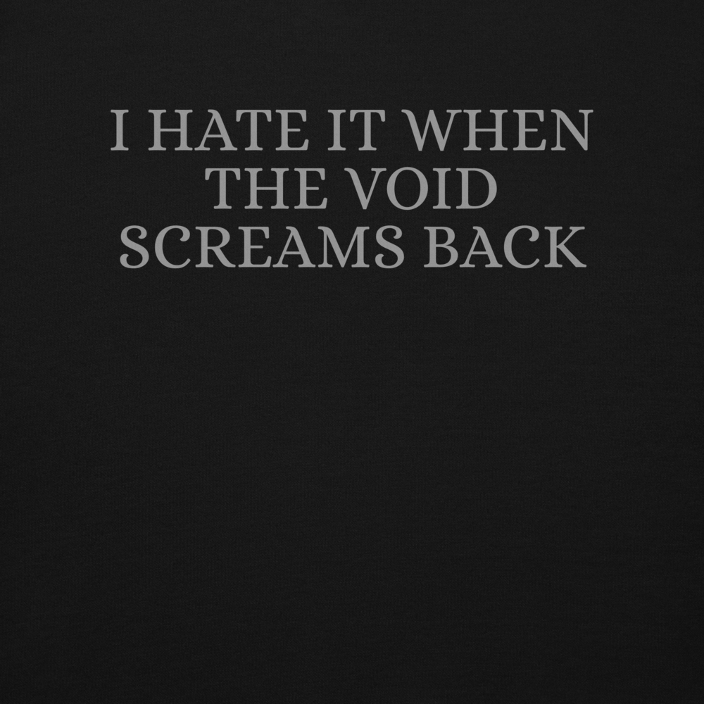 "I hate it when the void screams back" printed on a black background