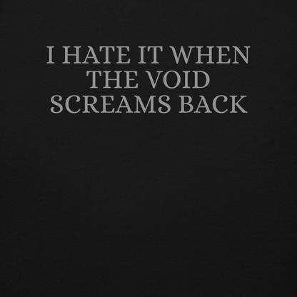 "I hate it when the void screams back" printed on a black background