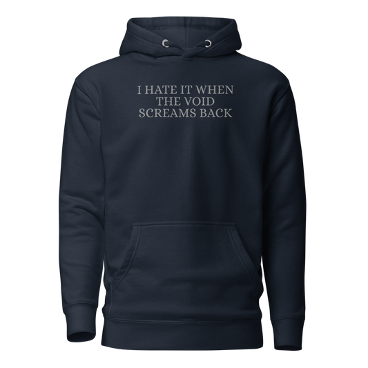 "I hate it when the void screams back" printed on a navy blazer on an invisible / simulated body