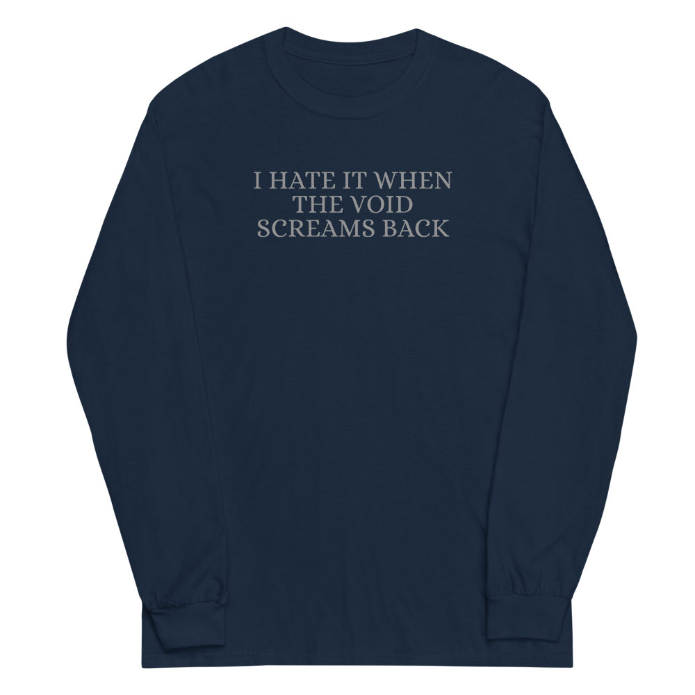 "I hate it when the void screams back" printed on a navy men's long sleeve shirt laying on a flat surface