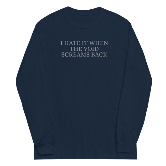 "I hate it when the void screams back" printed on a navy men's long sleeve shirt laying on a flat surface