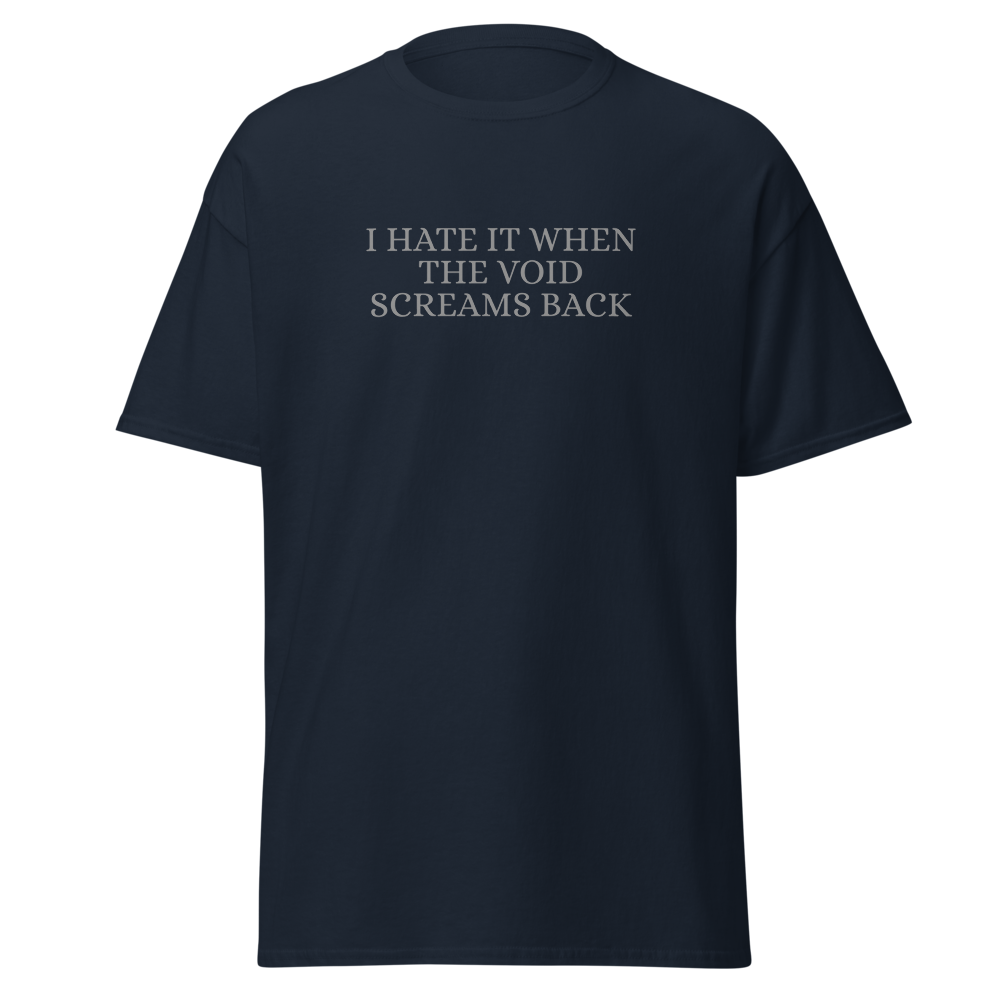 "I hate it when the void screams back" printed on a navy on an invisible body
