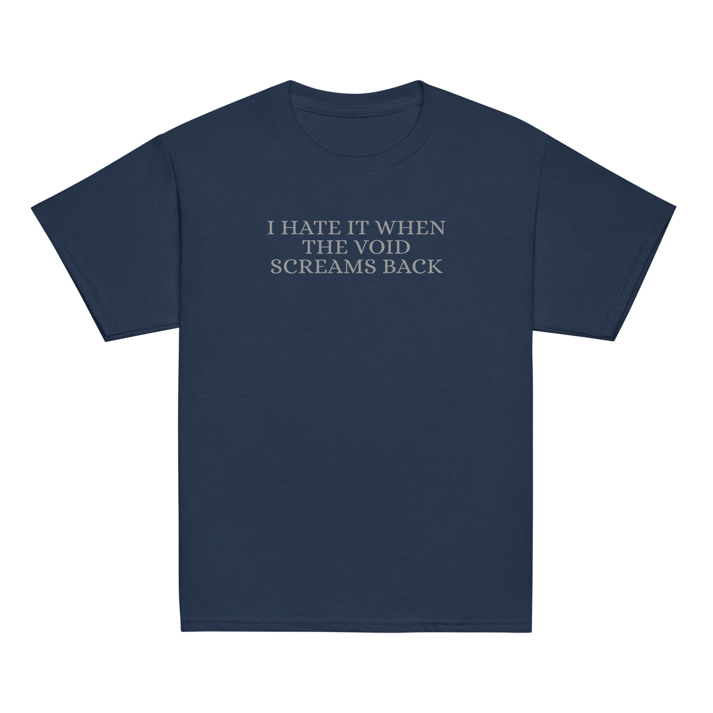 "I hate it when the void screams back" printed on a navy youth classic tee laying on a flat surface