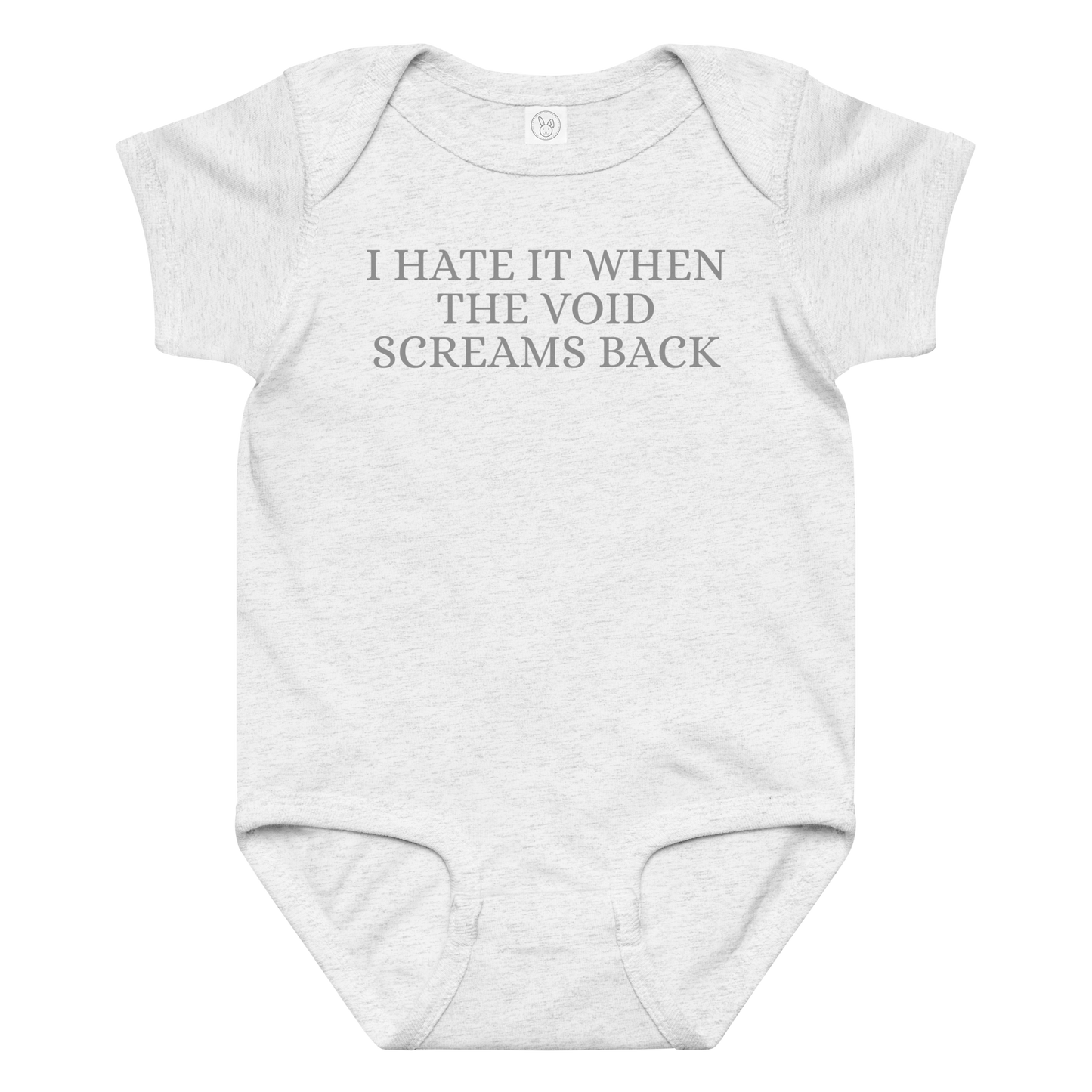 "I hate it when the void screams back" printed on a ash baby jersey bodysuit laying on a flat surface amongst other clothes
