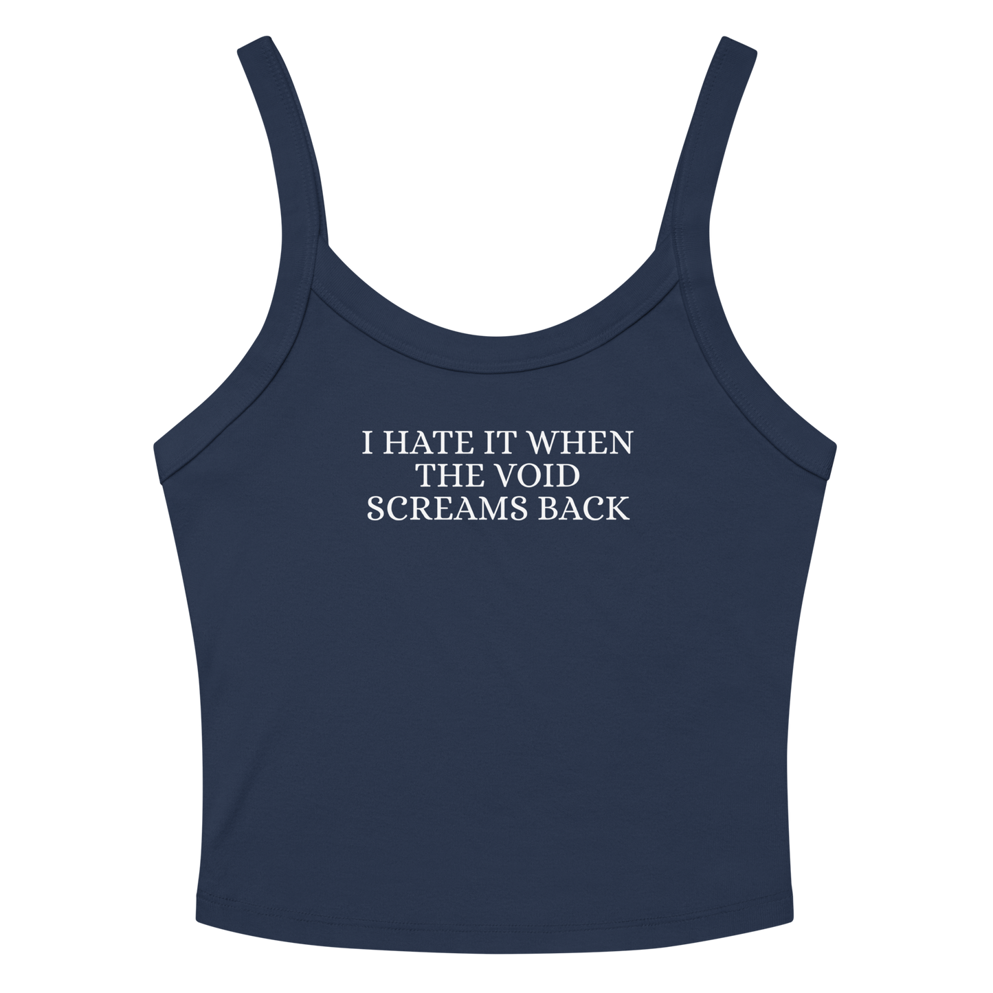 "I hate it when the void screams back" printed on a solid navy blend women's micro-rib tanktop laying on a flat surface amongst sunglasses and shorts