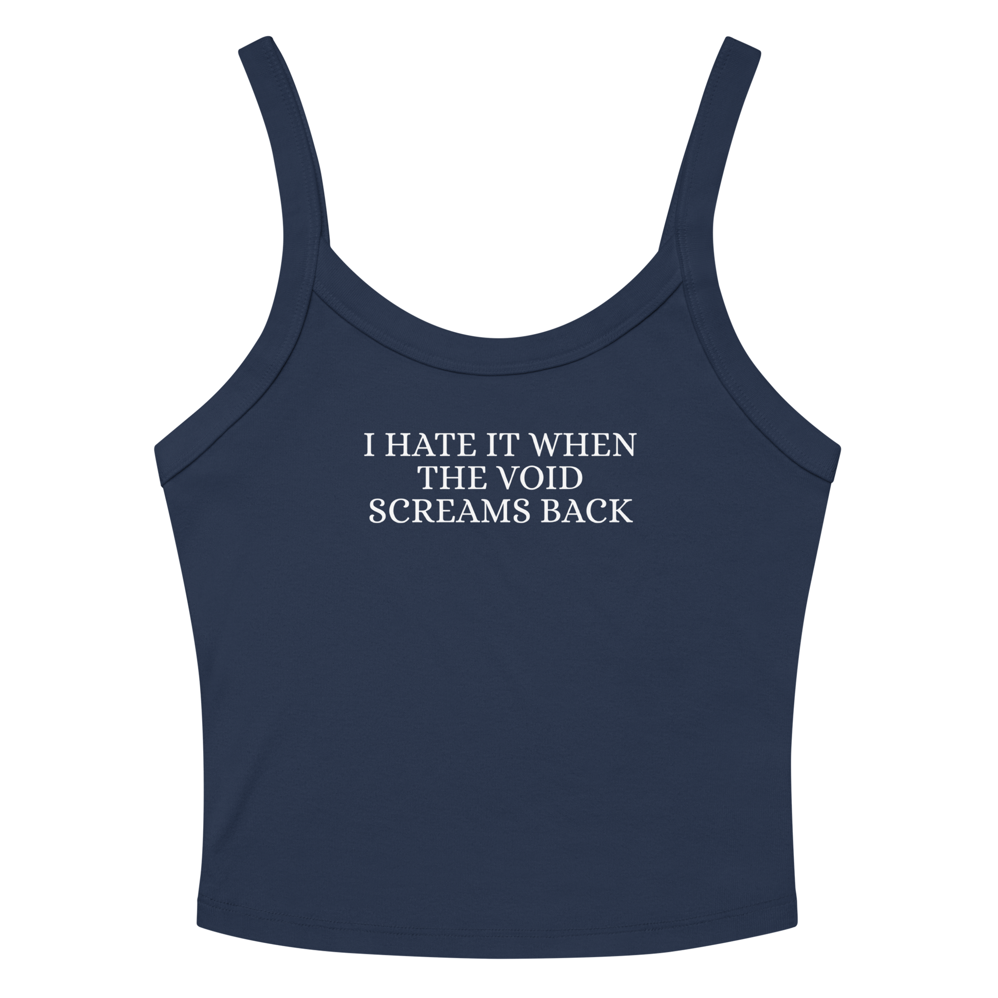 "I hate it when the void screams back" printed on a solid navy blend women's micro-rib tanktop laying on a flat surface amongst sunglasses and shorts