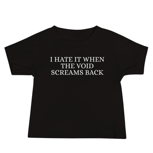 "I hate it when the void screams back" printed on a black baby jersey short sleeve tee laying on a flat surface
