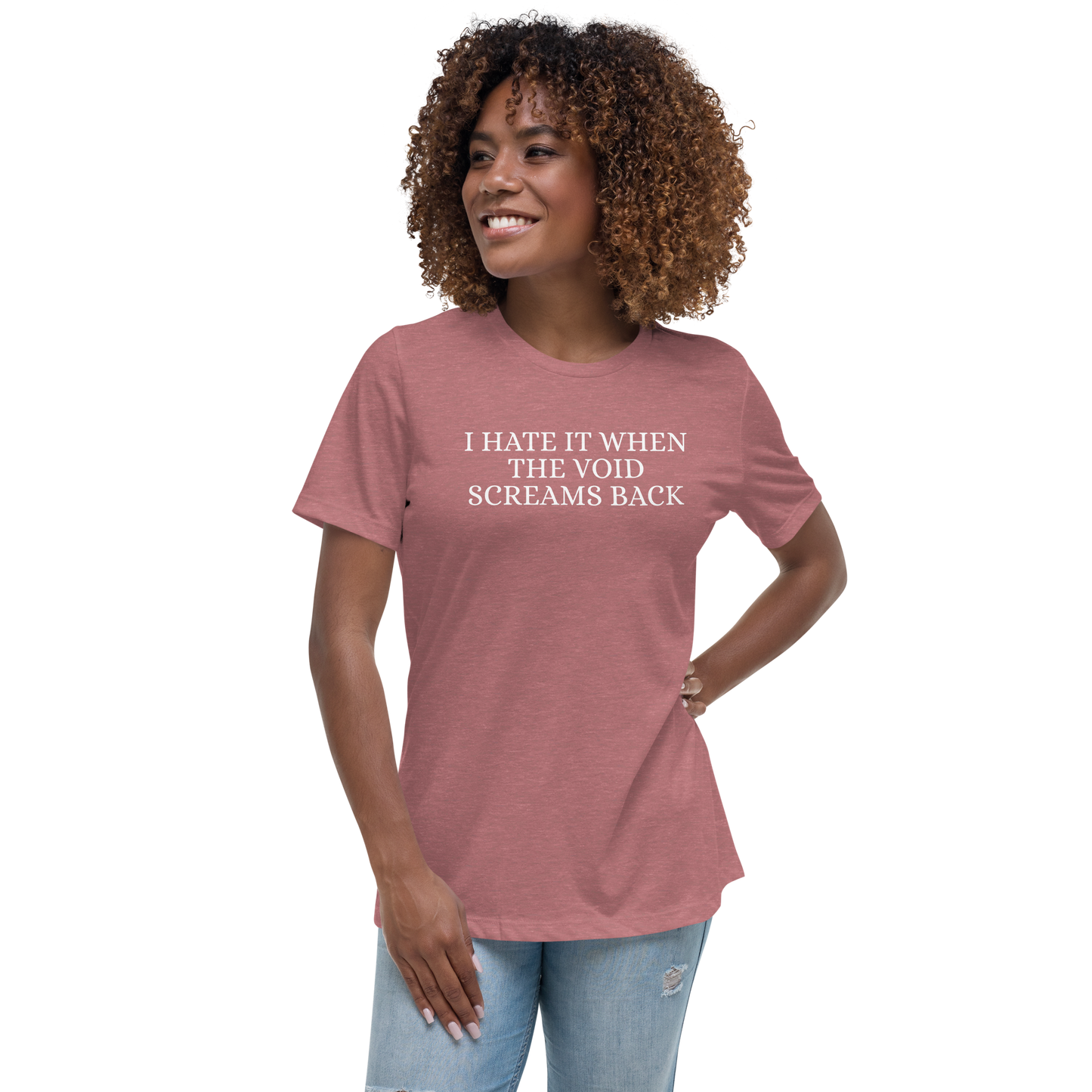 "I hate it when the void screams back" printed on a heather mauve women's relaxed t-shirt worn by a female