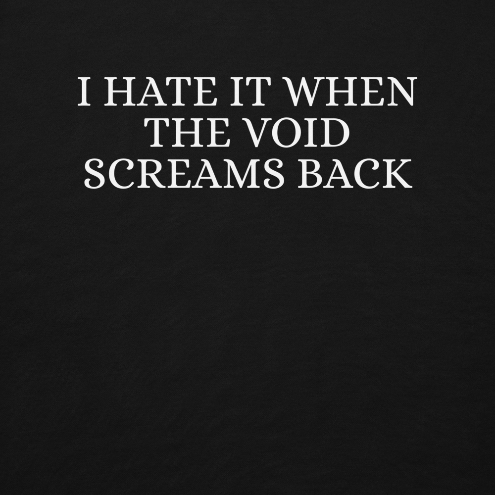 "I hate it when the void screams back" printed on a black background