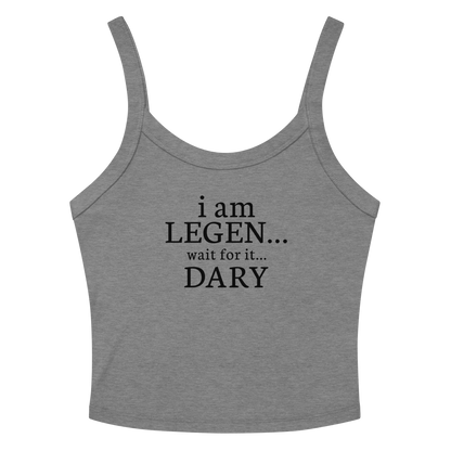 "I Am Legen... Wait For It... Dary" printed on a athletic heather women's micro-rib tanktop laying on a flat surface amongst sunglasses and shorts
