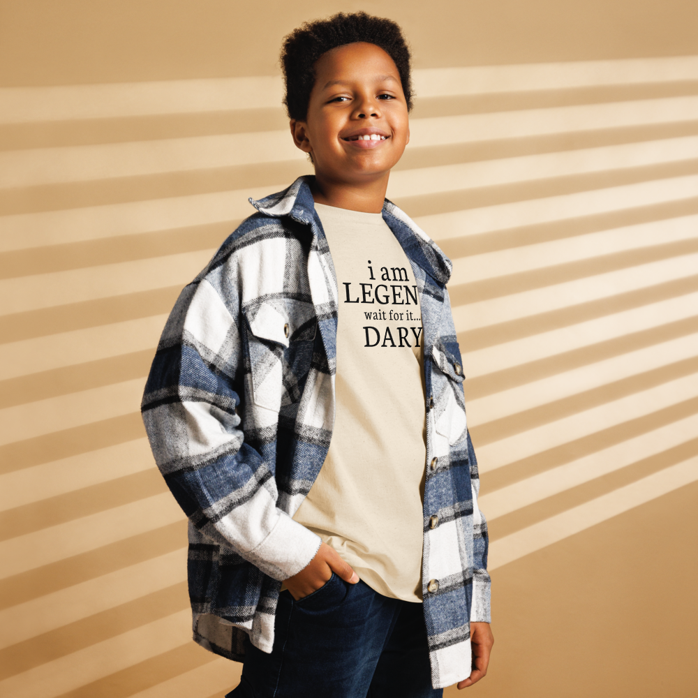 "I Am Legen... Wait For It... Dary" printed on a natural youth classic tee worn by a male also wearing a jacket