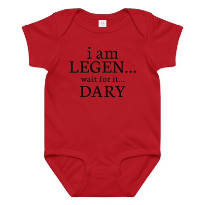 "I Am Legen... Wait For It... Dary" printed on a red baby jersey bodysuit laying on a flat surface amongst other clothes