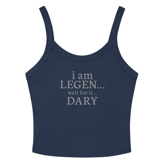"I Am Legen... Wait For It... Dary" printed on a solid navy blend women's micro-rib tanktop laying on a flat surface amongst sunglasses and shorts