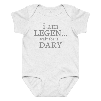 "I Am Legen... Wait For It... Dary" printed on a ash baby jersey bodysuit laying on a flat surface amongst other clothes