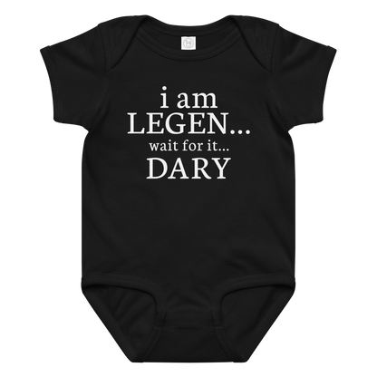 "I Am Legen... Wait For It... Dary" printed on a black baby jersey bodysuit laying on a flat surface amongst other clothes