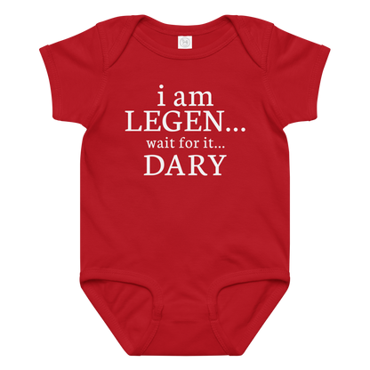 "I Am Legen... Wait For It... Dary" printed on a red baby jersey bodysuit laying on a flat surface amongst other clothes