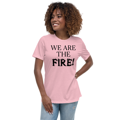 "We are the fire!" printed on a pink women's relaxed t-shirt worn by a female