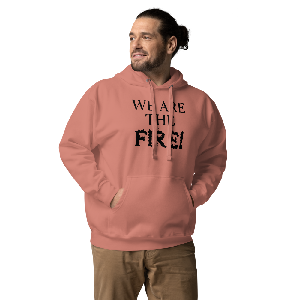 "We are the fire!" printed on a dusty rose unisex hoodie worn by a male