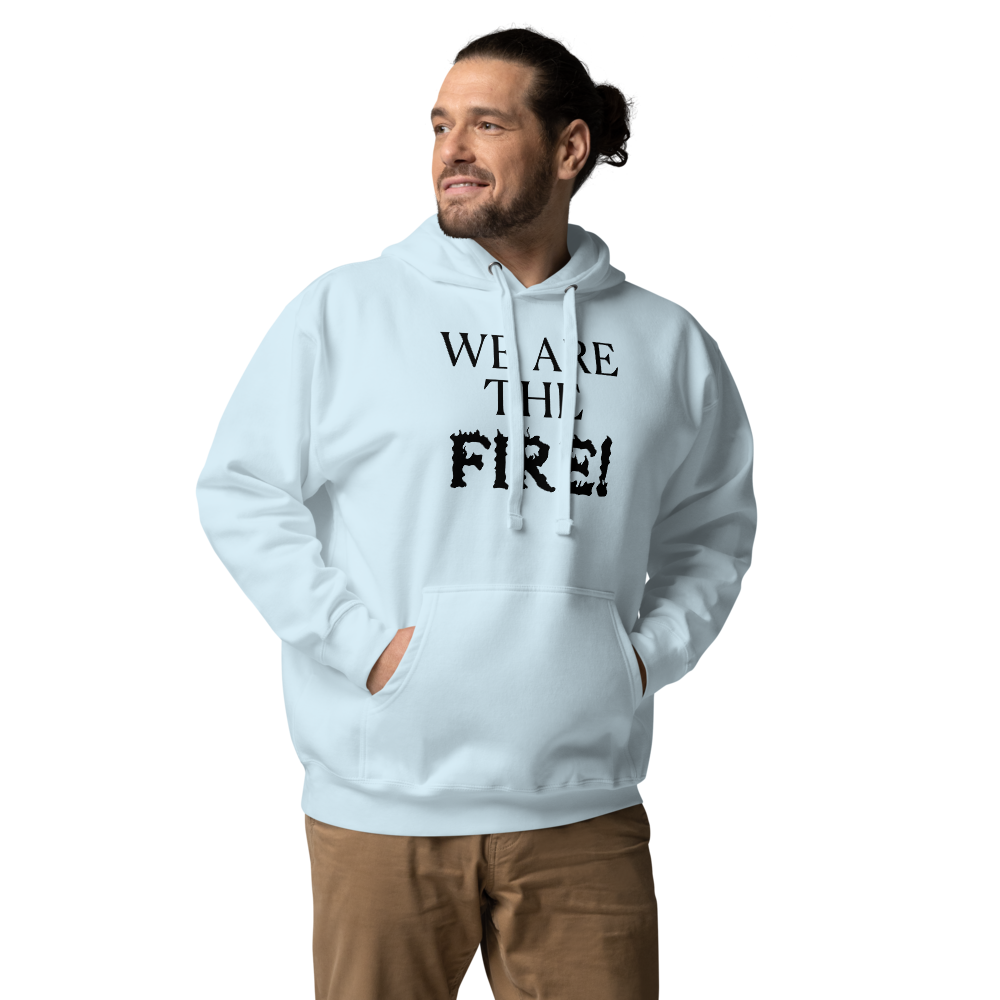 "We are the fire!" printed on a sky blue unisex hoodie worn by a male