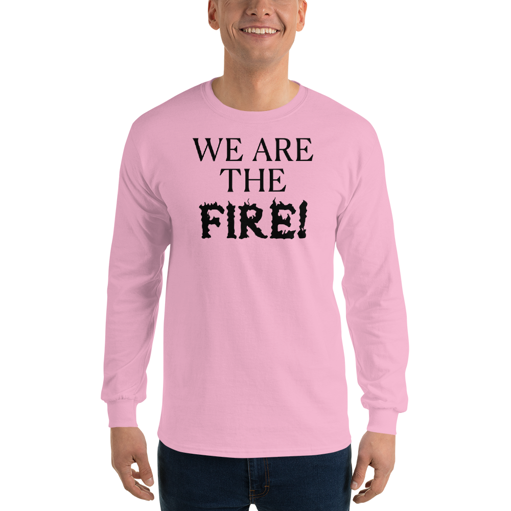 "We are the fire!" printed on a light pink men's long sleeve shirt worn by a male