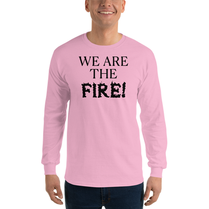 "We are the fire!" printed on a light pink men's long sleeve shirt worn by a male