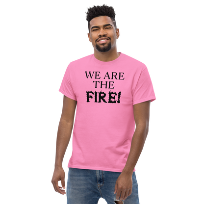 "We are the fire!" printed on a azalea unisex classic tee worn by a male