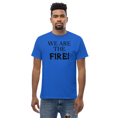"We are the fire!" printed on a royal unisex classic tee worn by a male