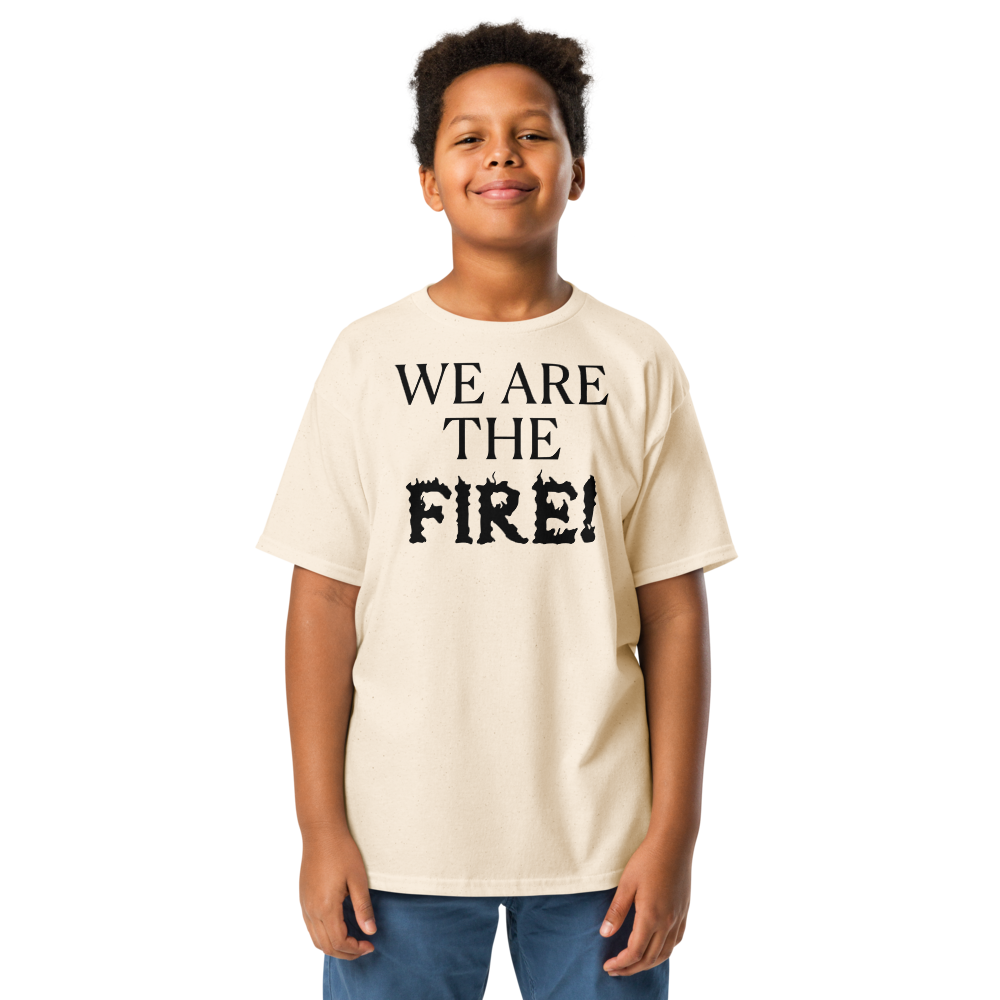 "We are the fire!" printed on a natural youth classic tee worn by a male
