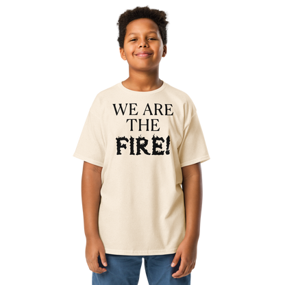 "We are the fire!" printed on a natural youth classic tee worn by a male