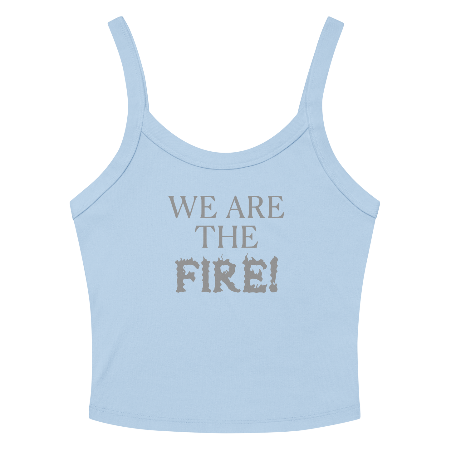 "We are the fire!" printed on a solid baby blue blend women's micro-rib tanktop laying on a flat surface amongst sunglasses and shorts