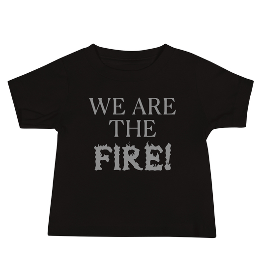 "We are the fire!" printed on a black baby jersey short sleeve tee laying on a flat surface