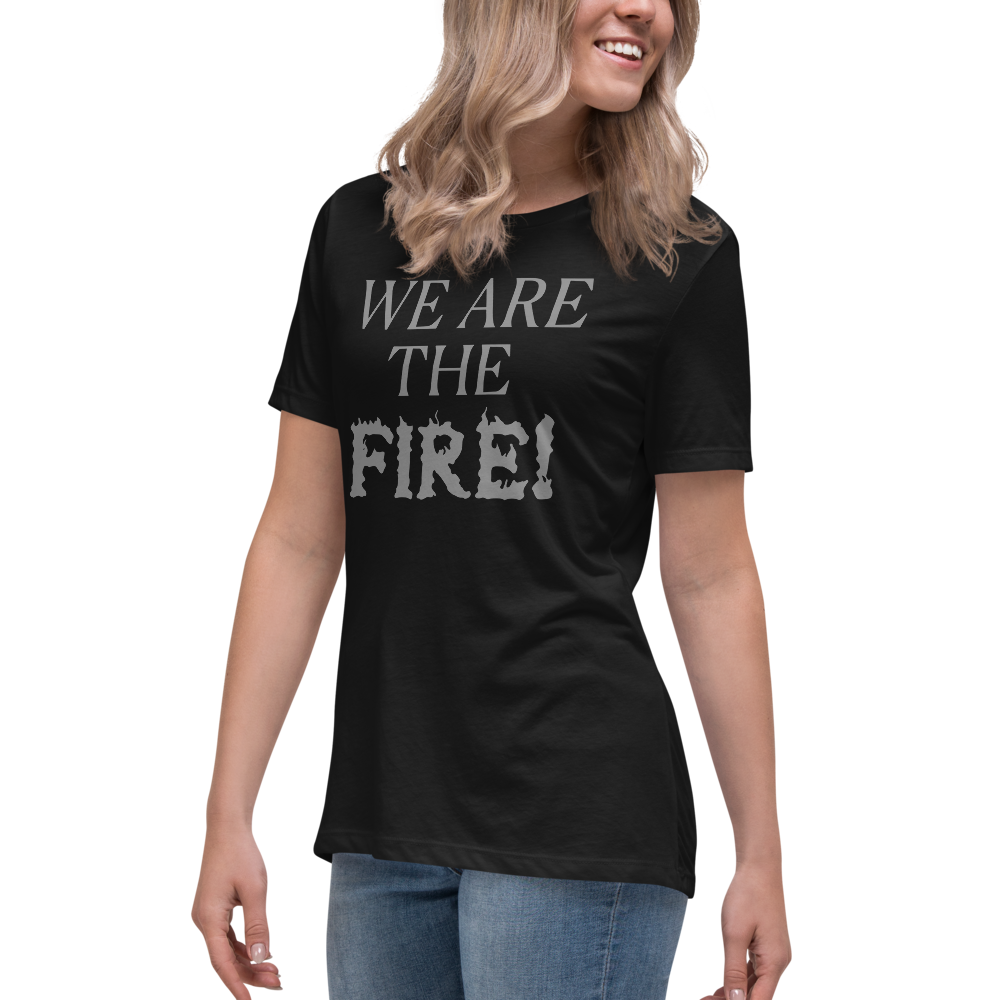 "We are the fire!" printed on a black women's relaxed t-shirt worn by a female
