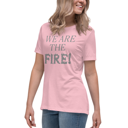 "We are the fire!" printed on a pink women's relaxed t-shirt worn by a female
