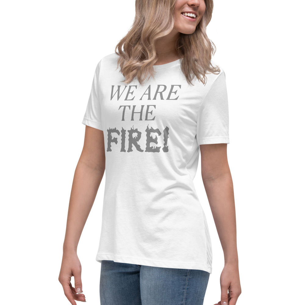 "We are the fire!" printed on a white women's relaxed t-shirt worn by a female