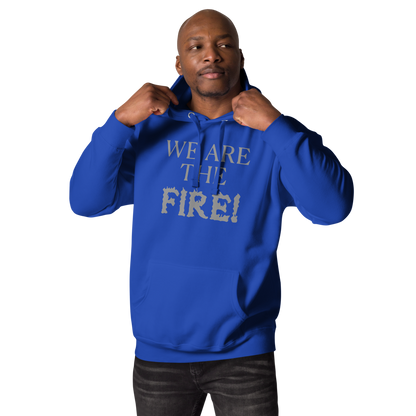 "We are the fire!" printed on a team royal unisex hoodie worn by a male