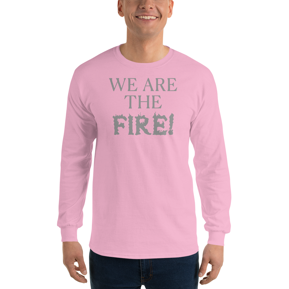 "We are the fire!" printed on a light pink men's long sleeve shirt worn by a male