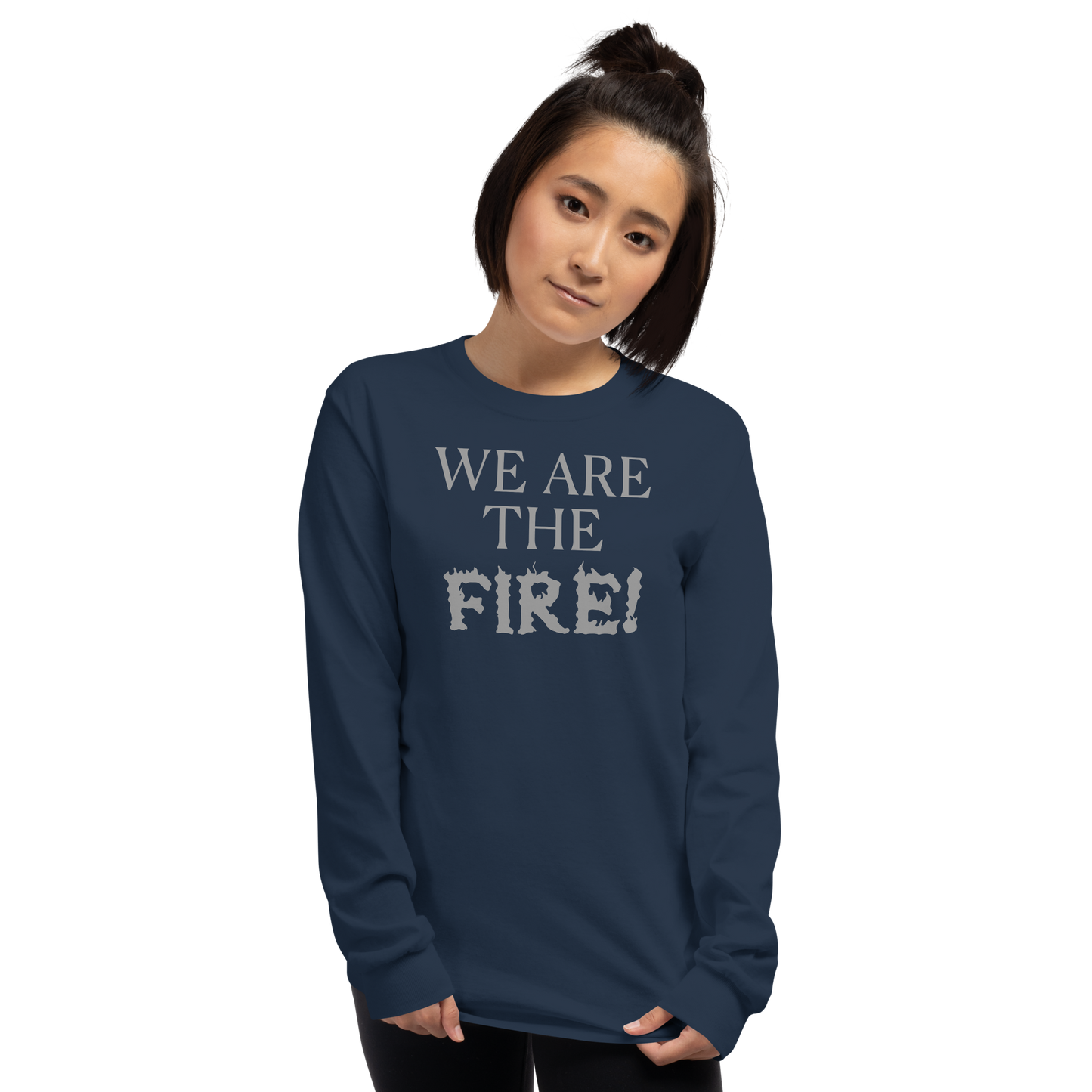 "We are the fire!" printed on a navy men's long sleeve shirt worn by a female