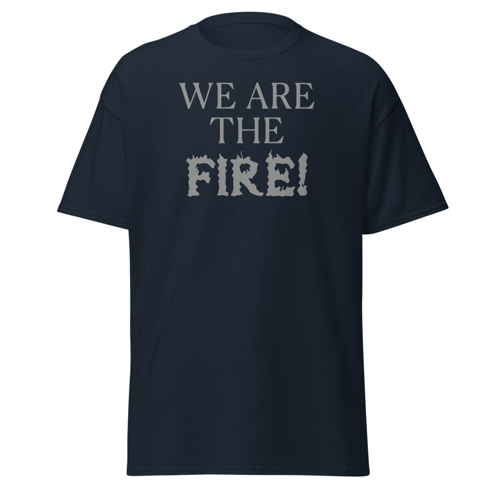 "We are the fire!" printed on a navy unisex classic tee laying on a flat surface