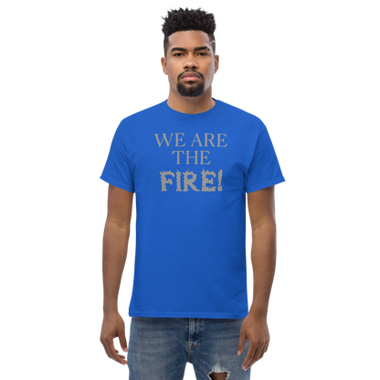 "We are the fire!" printed on a royal unisex classic tee worn by a male