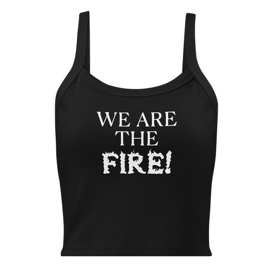 "We are the fire!" printed on a solid black blend women's micro-rib tanktop laying on a flat surface