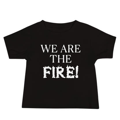 "We are the fire!" printed on a black baby jersey short sleeve tee laying on a flat surface