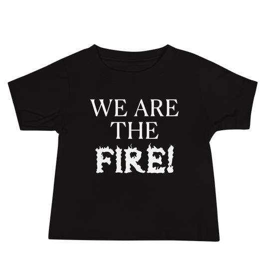 "We are the fire!" printed on a black baby jersey short sleeve tee laying on a flat surface