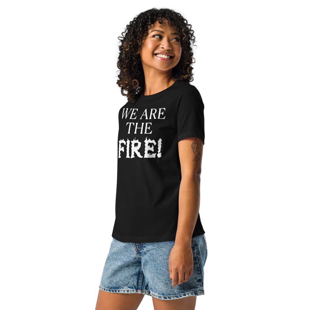 "We are the fire!" printed on a black women's relaxed t-shirt worn by a female