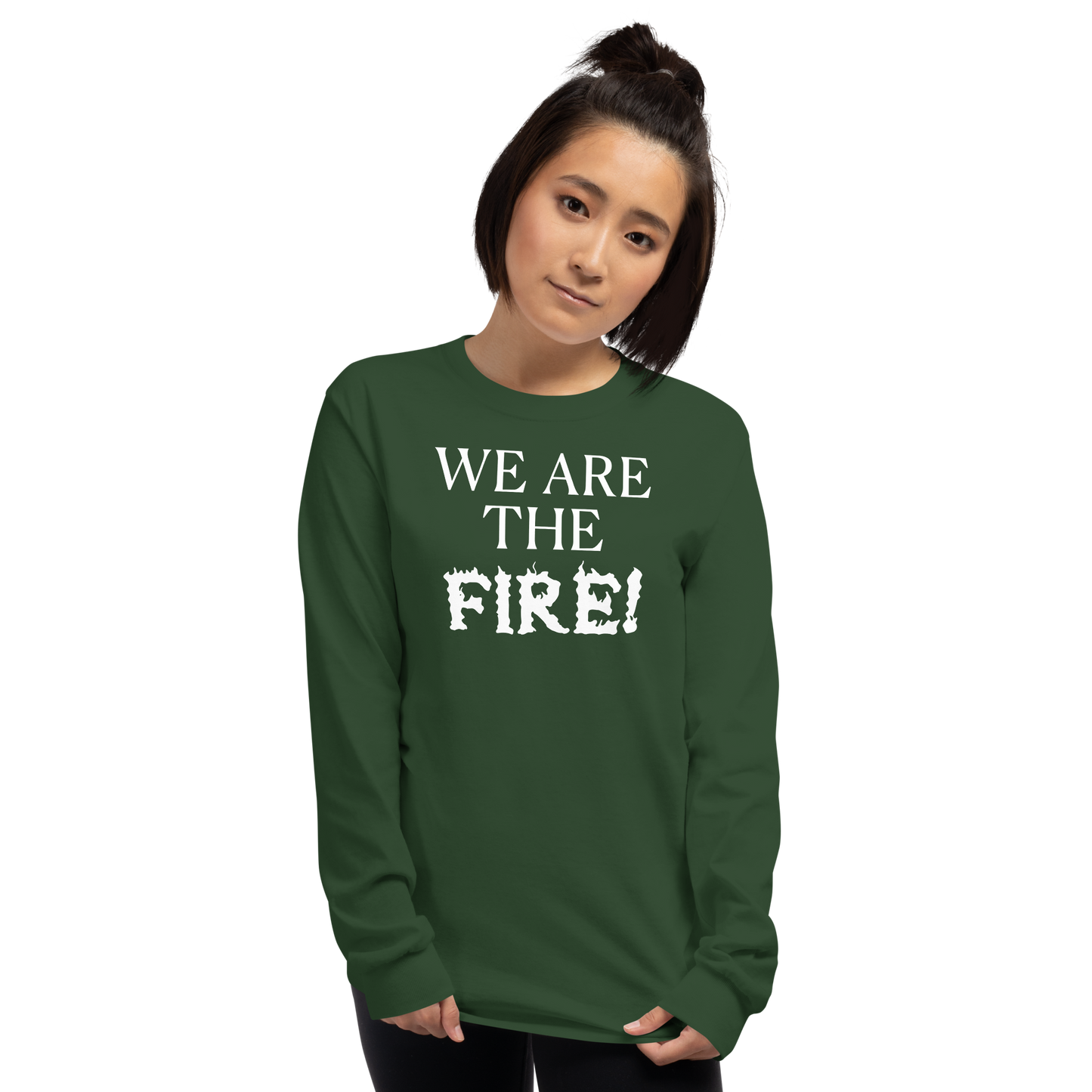 "We are the fire!" printed on a forest green men's long sleeve shirt worn by a female