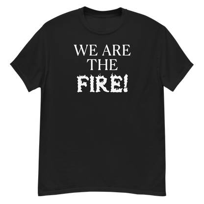 "We are the fire!" printed on a black unisex classic tee laying on a flat surface
