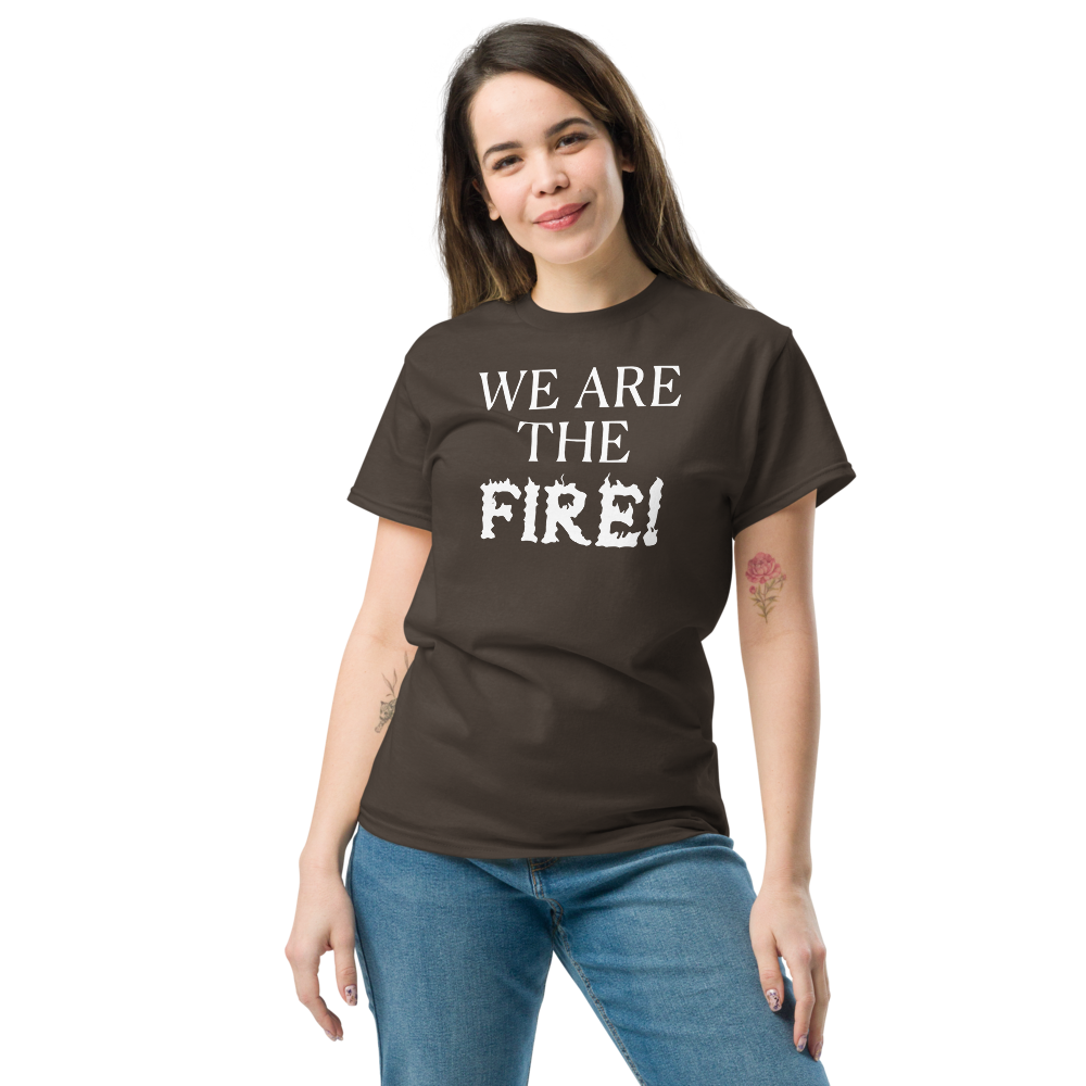 "We are the fire!" printed on a dark chocolate unisex classic tee worn by a female