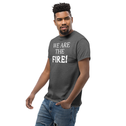 "We are the fire!" printed on a dark heather unisex classic tee worn by a male